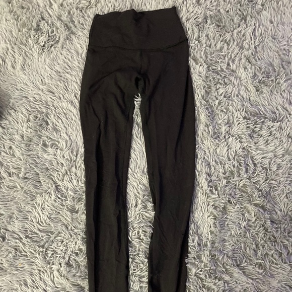 Worn Black Lululemon Wunder Under Leggings - Picture 2 of 4